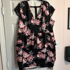 Floral and black body con style dress.